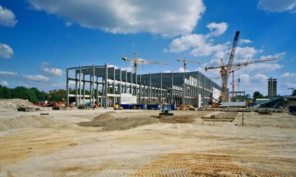 Commercial construction site in early development stage before final land survey verification