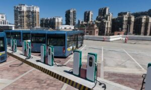 Alta land title survey ev bus charging station - ALTA SURVEY New York Electric buses parked at a new charging site where an alta land title survey ensures accurate construction planning.