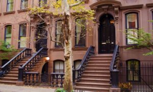 Brownstone party wall reconstruction - ALTA SURVEY New York Historic New York brownstone row houses with adjoining party walls, where a boundary line survey can help establish the property line